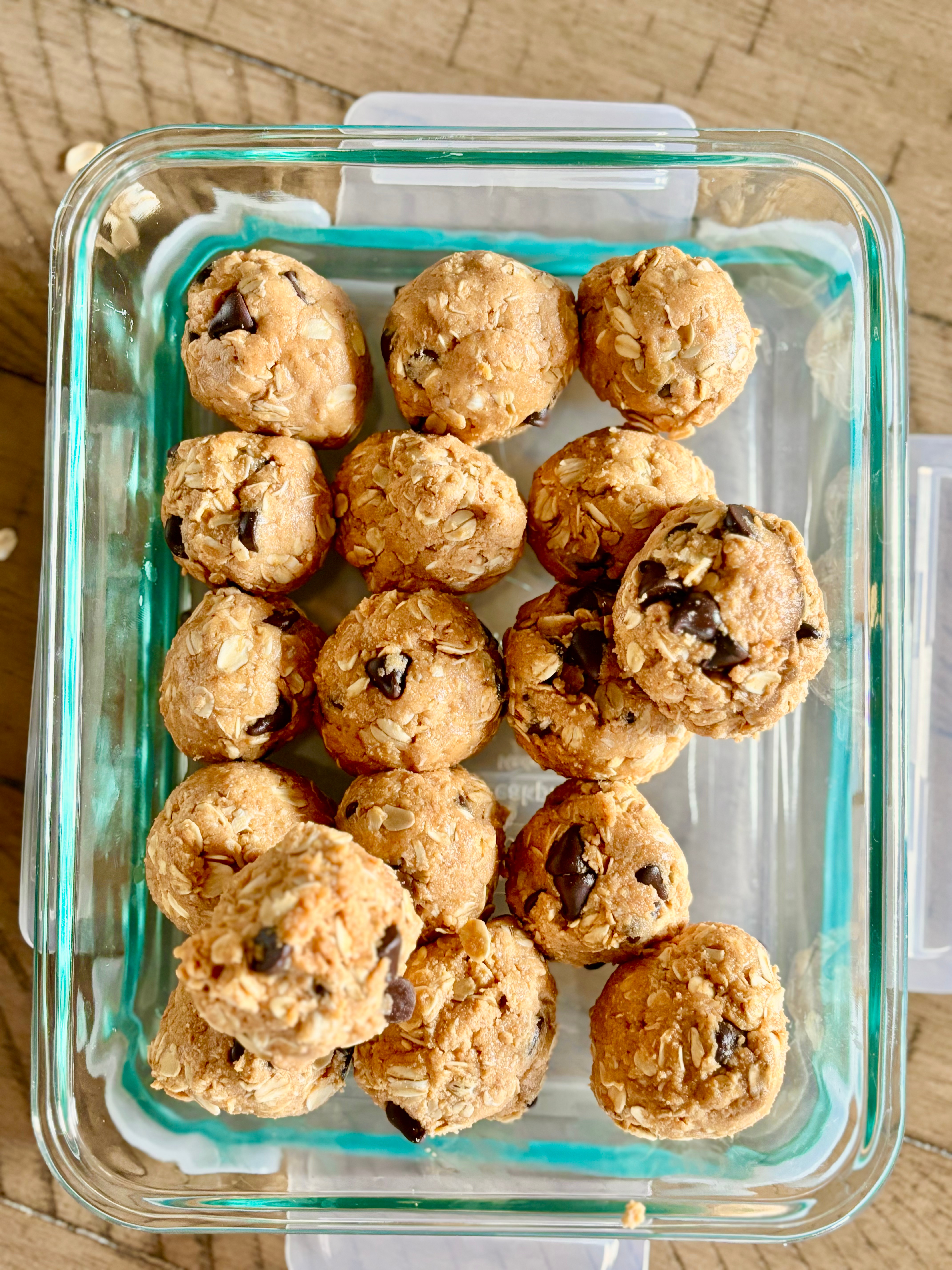 Top down view of protein balls in an airtight glass container.